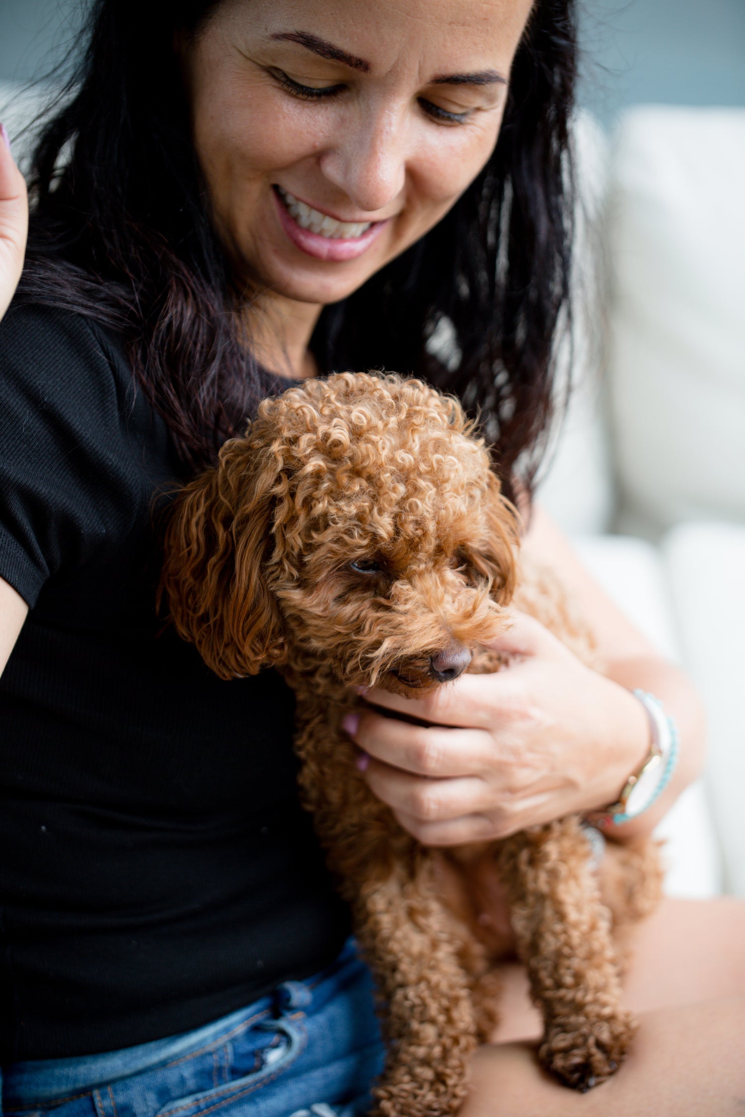 nancy sitting with Noodle on her lap